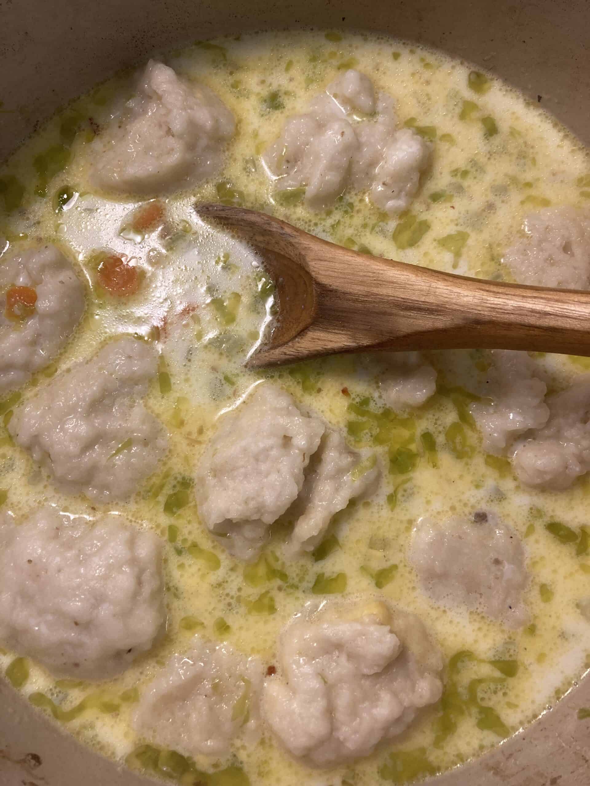 Sausage and Dumplings with carrots and celery. Soup Sausage and dumpling soup.